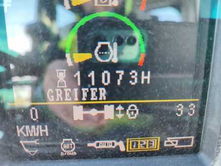 Pelle sur pneus 2010 Caterpillar M322D (6)