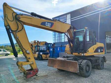 Pelle sur pneus 2009 Caterpillar M315D (2)