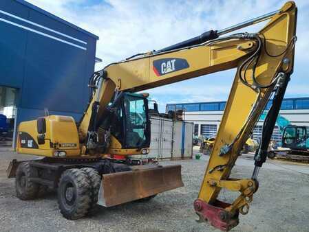 Pelle sur pneus 2009 Caterpillar M315D (3)