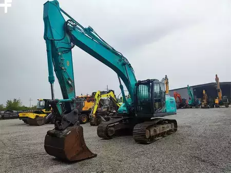 Rupsgraafmachines 2015 Kobelco SK210NLC-10 (2)