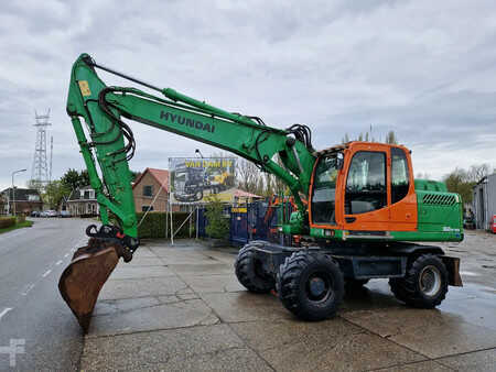 Excavadoras de ruedas 2015 Hyundai Robex 160W-9A met 6-cilinder Cummins motor (22)