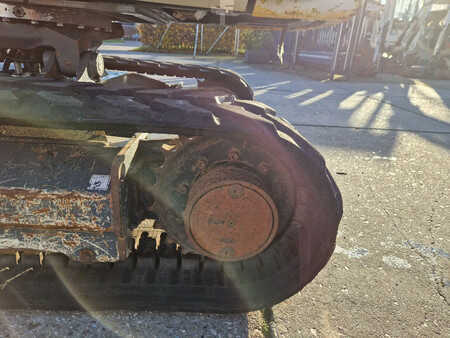 Minigraver 2011 Wacker Neuson 2404RD kan op een berghelling werken (14)