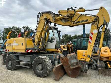 Pelle sur pneus 2012 Liebherr A314 LITRONIC (1)