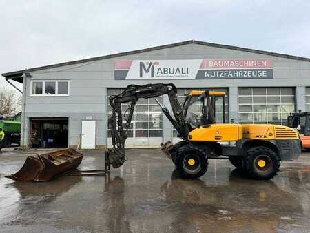 Mecalac 12 MTX Mit 4Löffeln und Eine Gabel