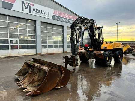 Mecalac 12 MTX Mit 4Löffeln und Eine Gabel