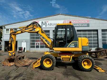 Mobilní bagry 2009 Komatsu PW110 R **BJ 2009 *4380 H/Alle Leitungen /SW (1)