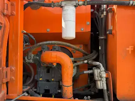 Mobil gravemaskin 2012 Doosan DX 140 W // BJ. 2012 / 7500H/SW/Schild (12)