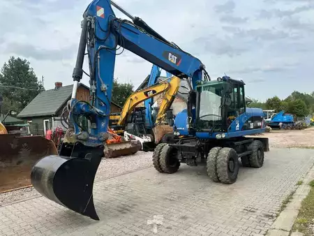 Escavadora de rodas 2009 Caterpillar M 318 D (1)
