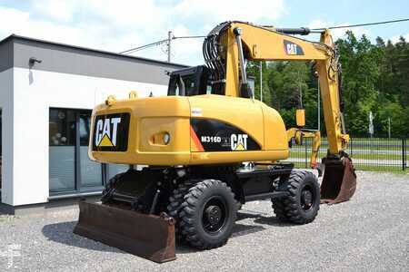 Pelle sur pneus 2013 Caterpillar M 316 D (10)