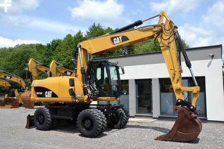 Pelle sur pneus 2013 Caterpillar M 316 D (13)