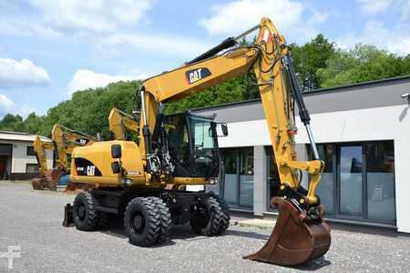 Pelle sur pneus 2013 Caterpillar M 316 D (14)