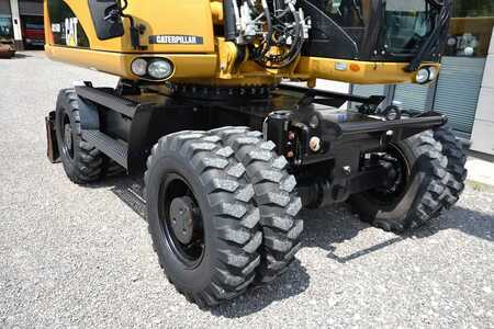 Pelle sur pneus 2013 Caterpillar M 316 D (16)