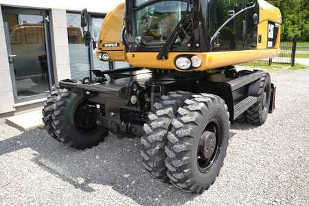 Pelle sur pneus 2013 Caterpillar M 316 D (17)