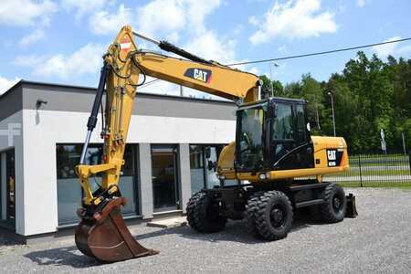 Pelle sur pneus 2013 Caterpillar M 316 D (3)