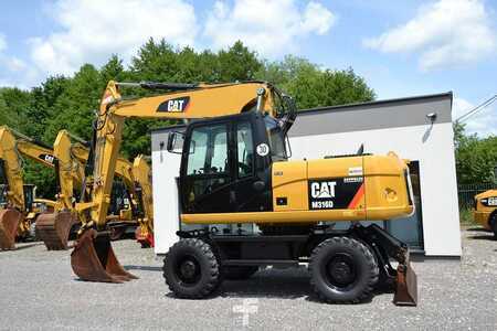 Pelle sur pneus 2013 Caterpillar M 316 D (5)