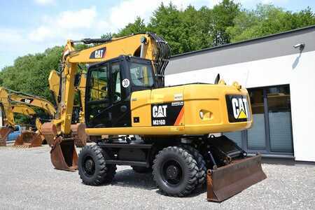 Pelle sur pneus 2013 Caterpillar M 316 D (6)