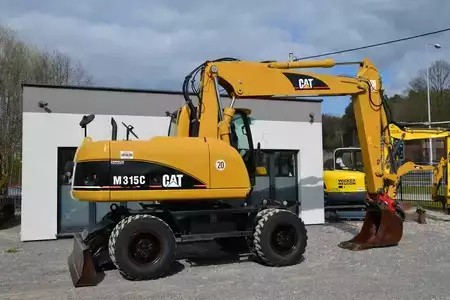 Pelle sur pneus 2006 Caterpillar M 315 C (11)