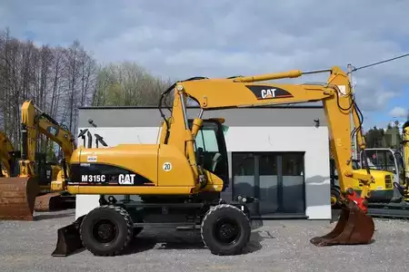 Pelle sur pneus 2006 Caterpillar M 315 C (12)