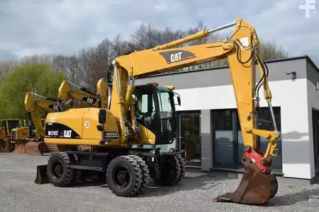 Pelle sur pneus 2006 Caterpillar M 315 C (14)