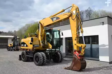 Pelle sur pneus 2006 Caterpillar M 315 C (15)