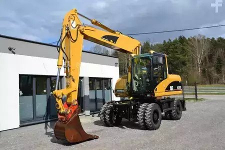 Pelle sur pneus 2006 Caterpillar M 315 C (2)