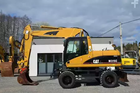 Pelle sur pneus 2006 Caterpillar M 315 C (4)