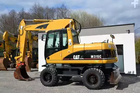 Pelle sur pneus 2006 Caterpillar M 315 C (5)