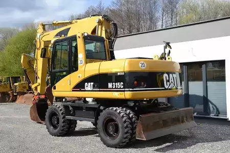 Pelle sur pneus 2006 Caterpillar M 315 C (6)