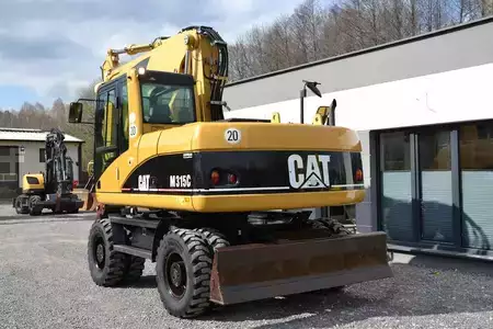 Pelle sur pneus 2006 Caterpillar M 315 C (7)