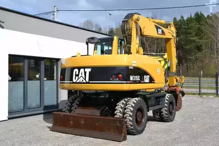 Pelle sur pneus 2006 Caterpillar M 315 C (9)