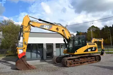 Koparki gąsienicowe 2009 Caterpillar 319DL (1)