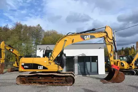 Koparki gąsienicowe 2009 Caterpillar 319DL (12)