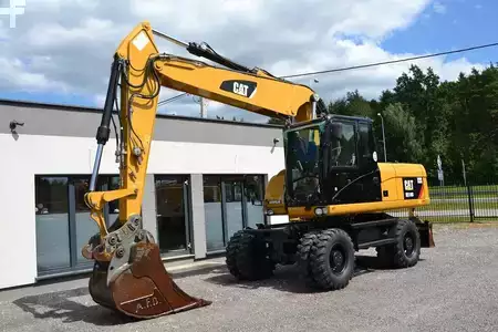 Escavatori gommati 2012 Caterpillar 318 D (1)
