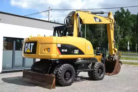 Escavatori gommati 2012 Caterpillar 318 D (10)