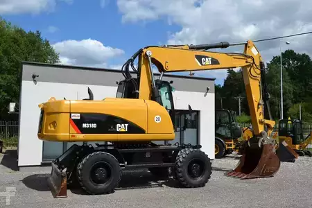 Escavatori gommati 2012 Caterpillar 318 D (11)