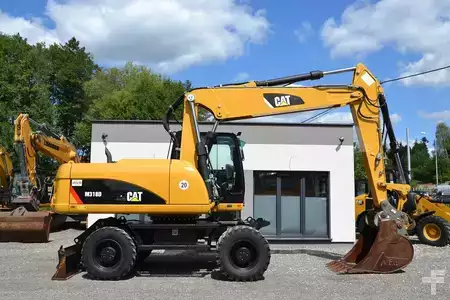 Escavatori gommati 2012 Caterpillar 318 D (12)
