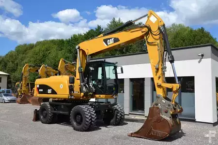 Escavatori gommati 2012 Caterpillar 318 D (14)