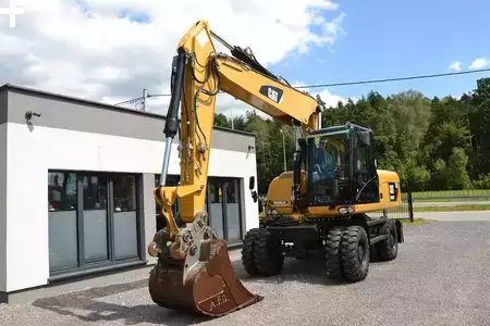 Escavatori gommati 2012 Caterpillar 318 D (2)