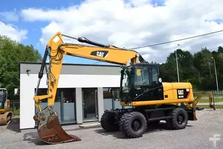 Escavatori gommati 2012 Caterpillar 318 D (3)