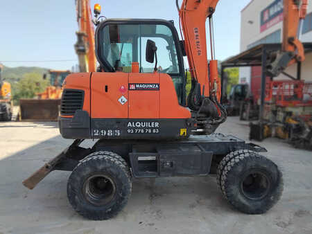 Pelle sur pneus 2010 Doosan DX55W (10)