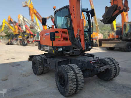 Pelle sur pneus 2010 Doosan DX55W (12)