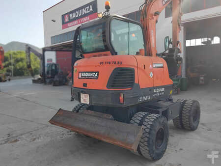 Pelle sur pneus 2010 Doosan DX55W (13)