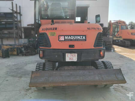 Pelle sur pneus 2010 Doosan DX55W (14)