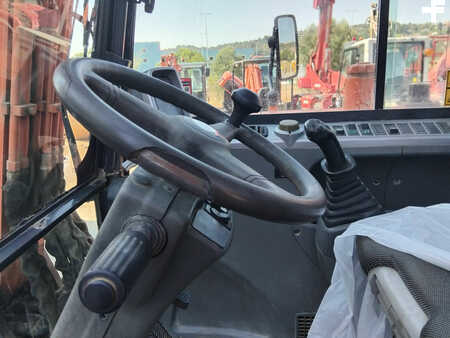 Pelle sur pneus 2010 Doosan DX55W (15)