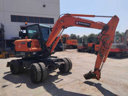 Pelle sur pneus 2010 Doosan DX55W (4)