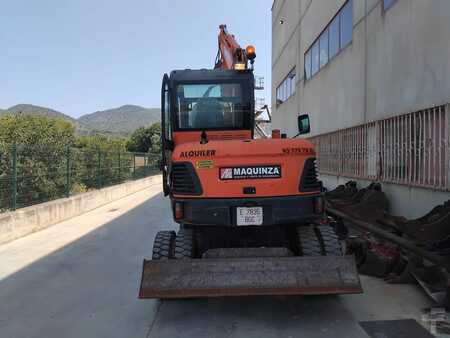 Pelle sur pneus 2010 Doosan DX55W (6)