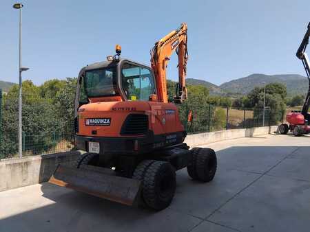 Pelle sur pneus 2010 Doosan DX55W (7)