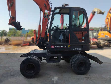 Pelle sur pneus 2010 Doosan DX55W (9)