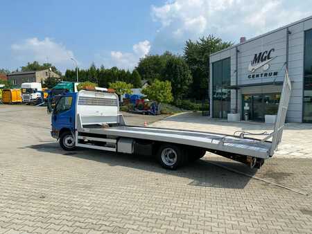 Mitsubishi Canter 3,0 D. mobile platform for transporting cars and machines