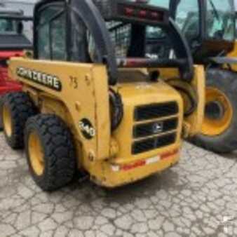 Cargadores compactas 1999 John Deere 240 (1)